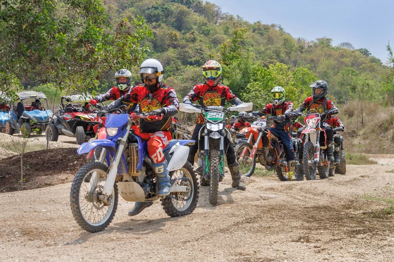 Easy Rider dirt bike riders together at the start of a trail